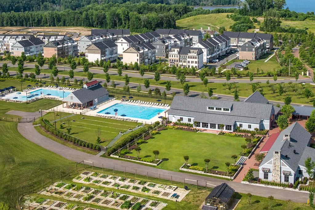 Senior friends walking in public park